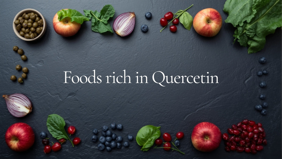 Foods rich in quercetin, with capers, red onion, kale, apples, berries and pomegranate framing the text on a dark slate surface